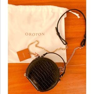 Cow leather black circle crossbody bag